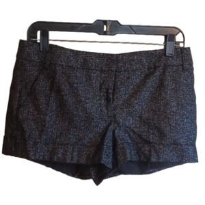 Express  metallic/ silver threaded shorts .  Black shorts with silver! Size 4